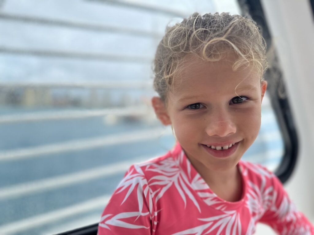 Things to do in Oahu with kids at Makapuʻu Lighthouse Trail, showing a coastal path and lighthouse overlooking the ocean.