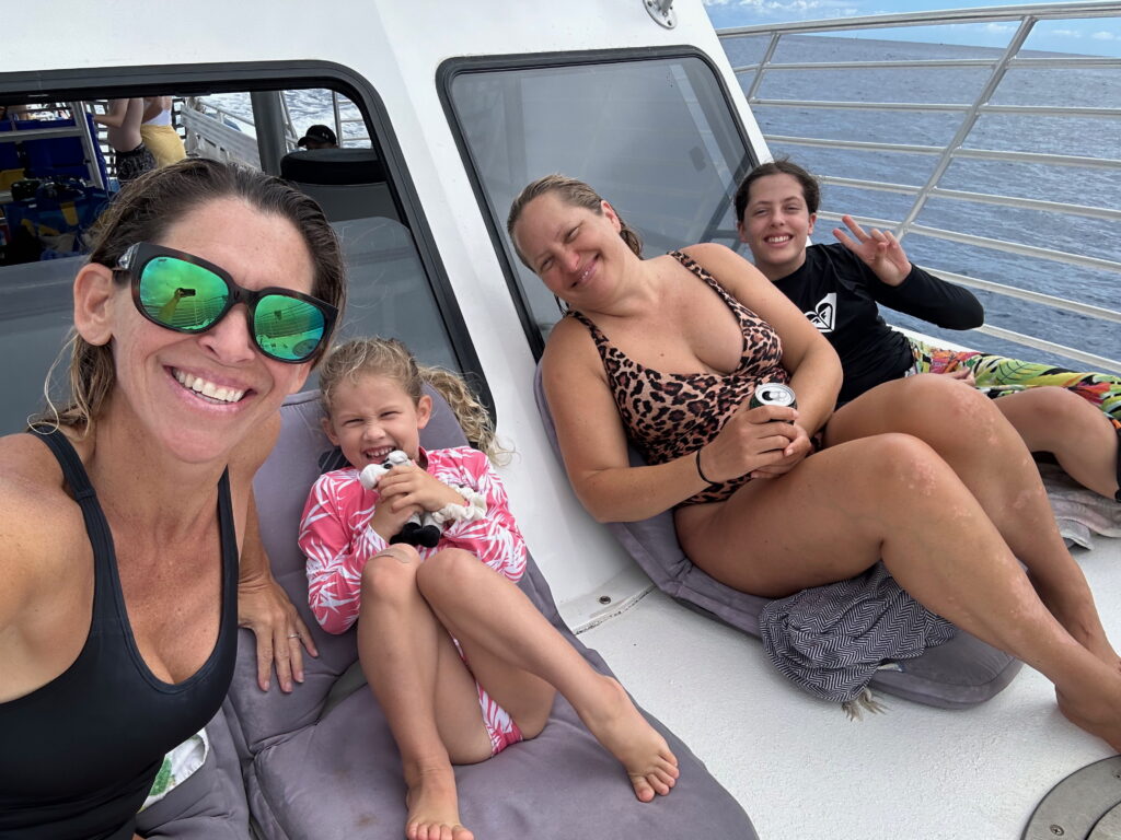 Guests enjoying a sunset cruise in Waikiki.